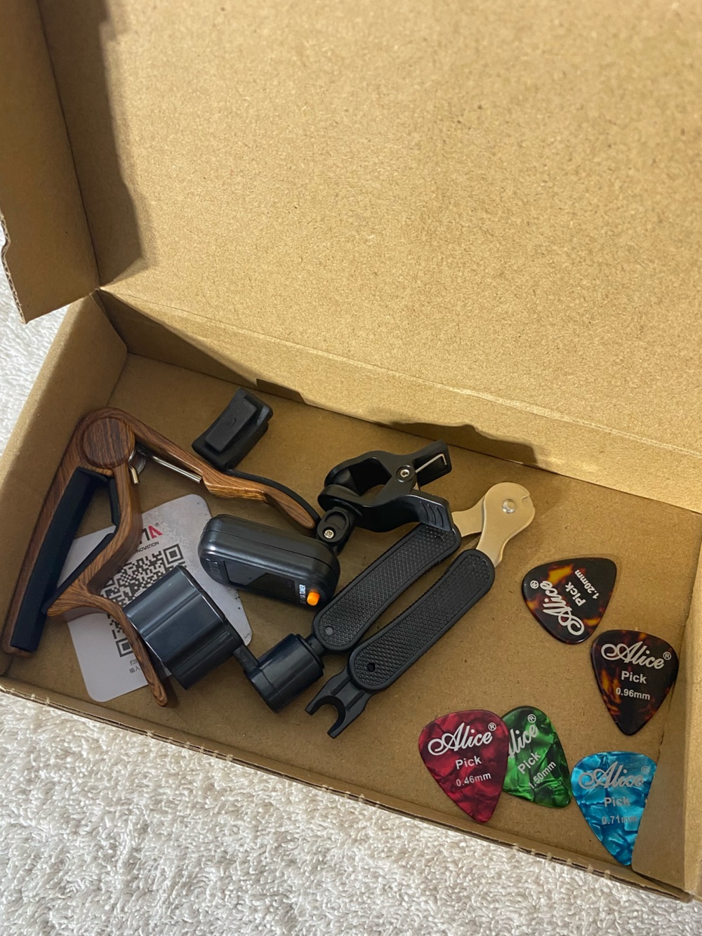 5/$35 Essential 4-in-1 Guitar Accessory Kit (Capo, Tuner, String Winder, Picks)